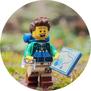 Lego man navigating around an autism-friendly theme park