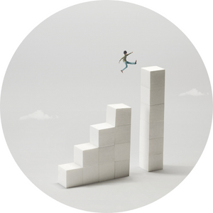 White cubes create steps in front of a light gray background with two little clouds. A miniature clay figure is shown jumping across the gap between steps.