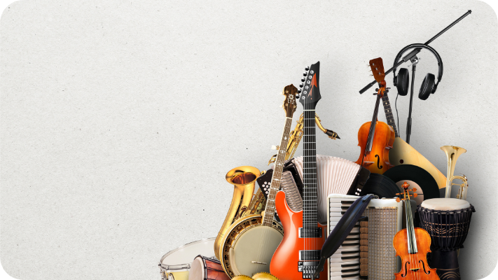 Leaning against a wall are a wide variety of instruments, some of which are a small bongo, maracas, a banjo, a saxophone, a bright orange electric guitar, an accordion, a viola, and others.